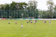 Two Quidditch teams play on a pitch at SV Arminia Hannover stadium. Photo: Michael Matthey/dpa (Photo by Michael Matthey/picture alliance via Getty Images)